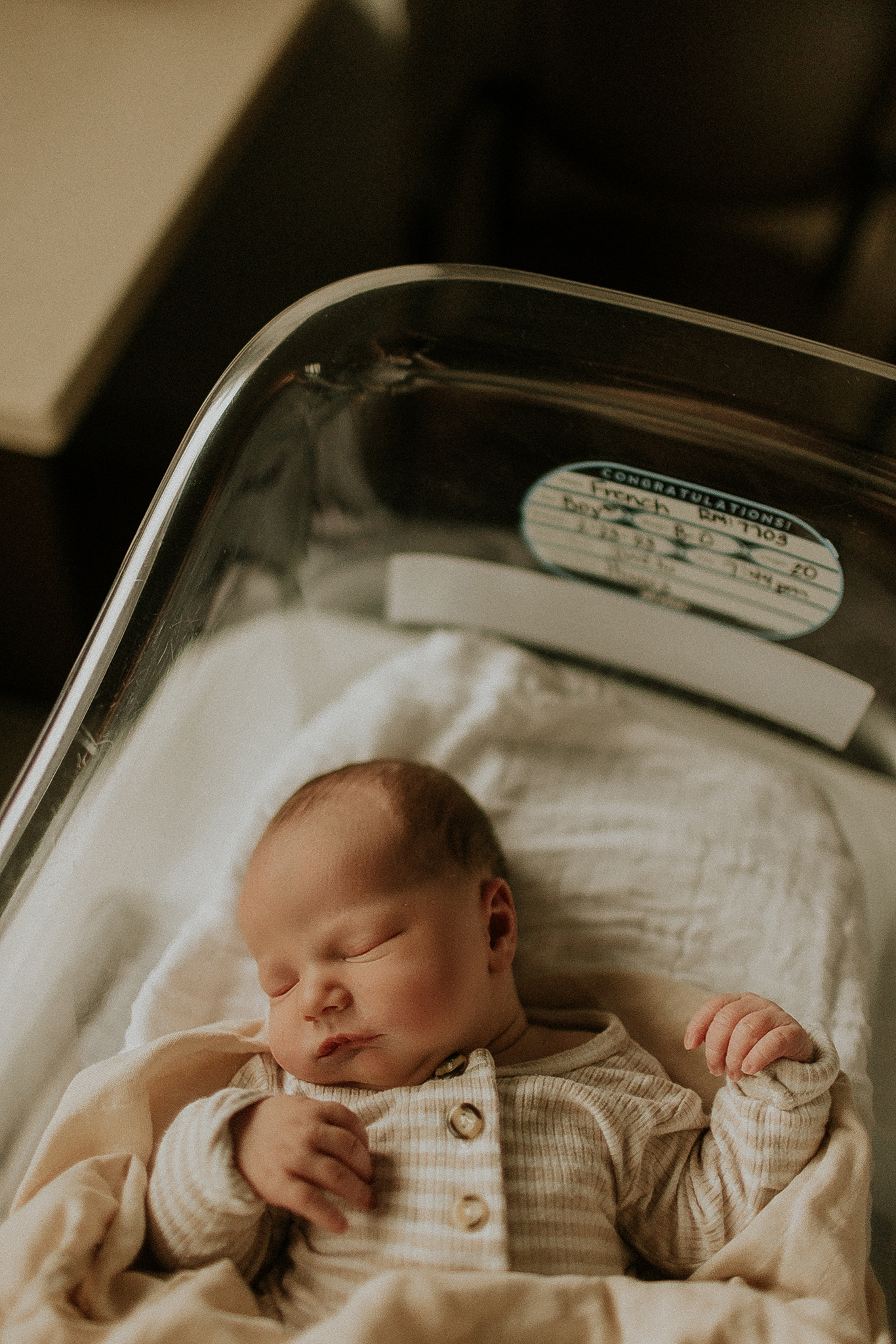 baby in bassinet in hospital
