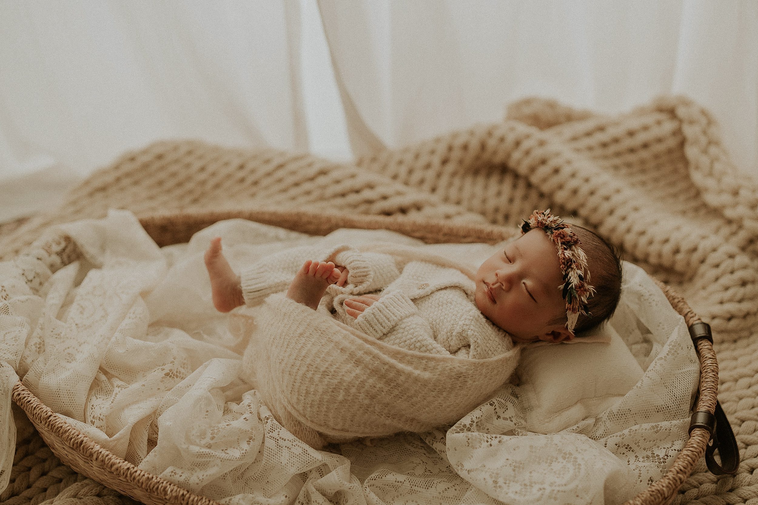 newborn swaddled in studio